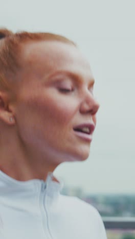 a focused athlete in motion: capturing the determination and grace of a female runner preparing for a challenging workout against a dynamic urban background