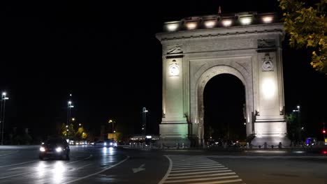 the arcul de triumf arc de triomphe bucharest romania at night