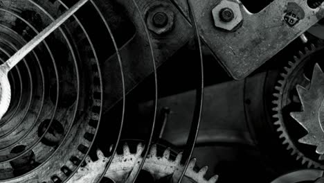 mecanismo de reloj vintage que funciona macro en blanco y negro 4k