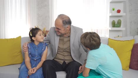 Funny-and-storyteller-grandfather-tells-his-grandchildren.