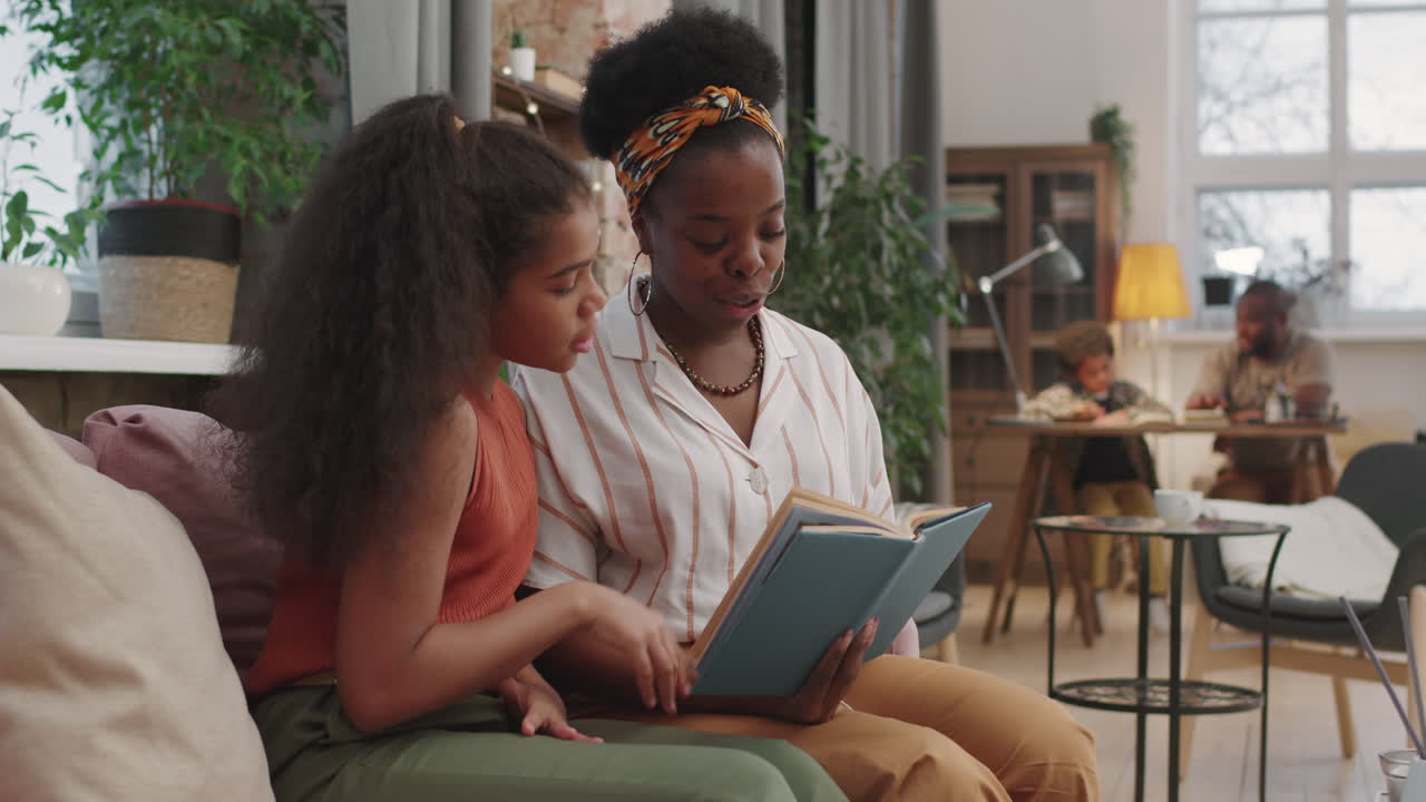 Afro Family Together In Cozy Living Room