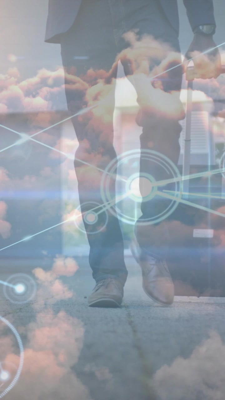Animation of data processing over african american businessman walking