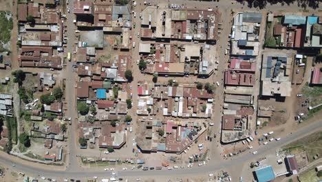 everyday street life in african town, birds eye perspective on houses and infrastructure