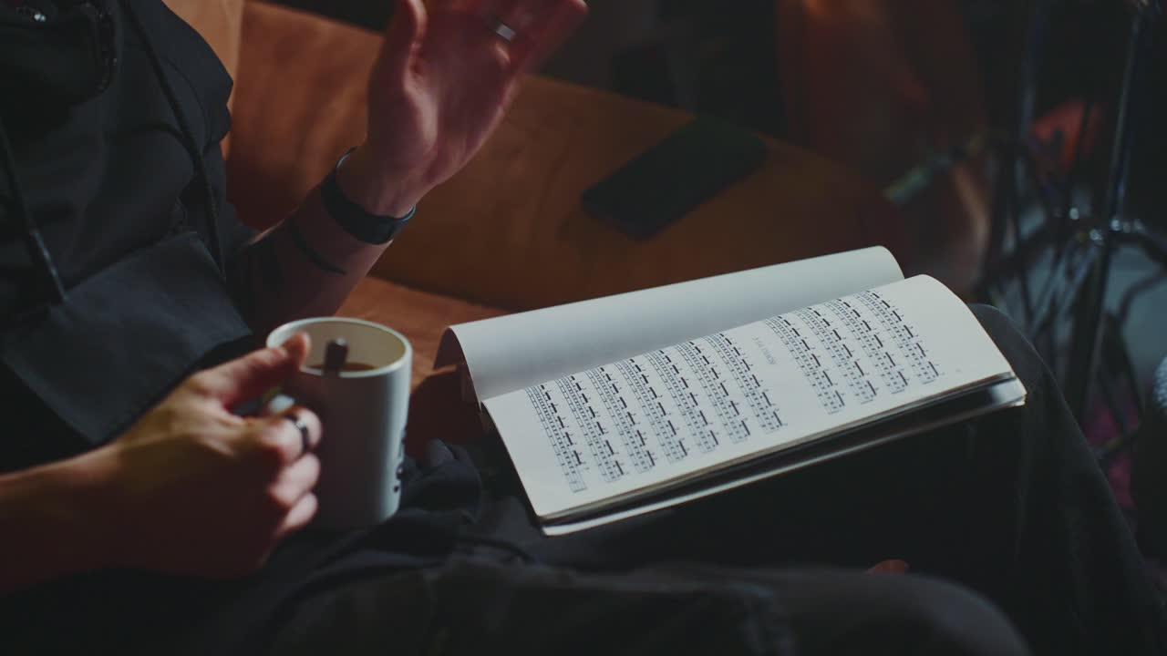 Person preparing for a musical performance