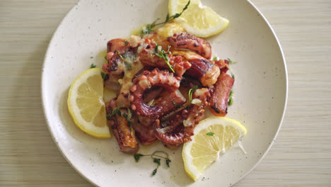 grilled octopus or squid with butter lemon sauce and thyme