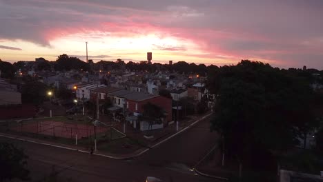 aerial of beautiful sunset on a peaceful night over posadas, misiones, argentina