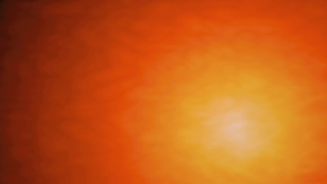 Abstract Glowing Orange Light Pulse on Black Background