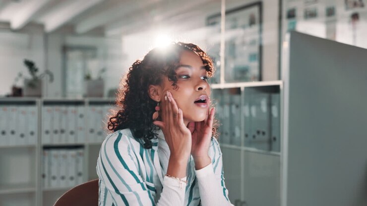 Woman in office expresses shock and concern