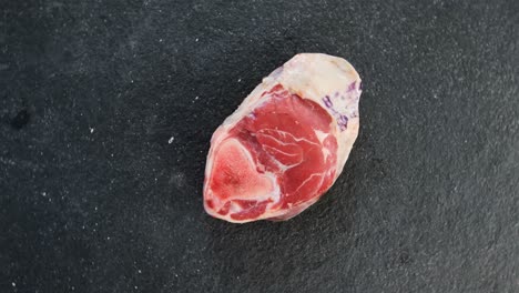 sirloin chop on concrete background