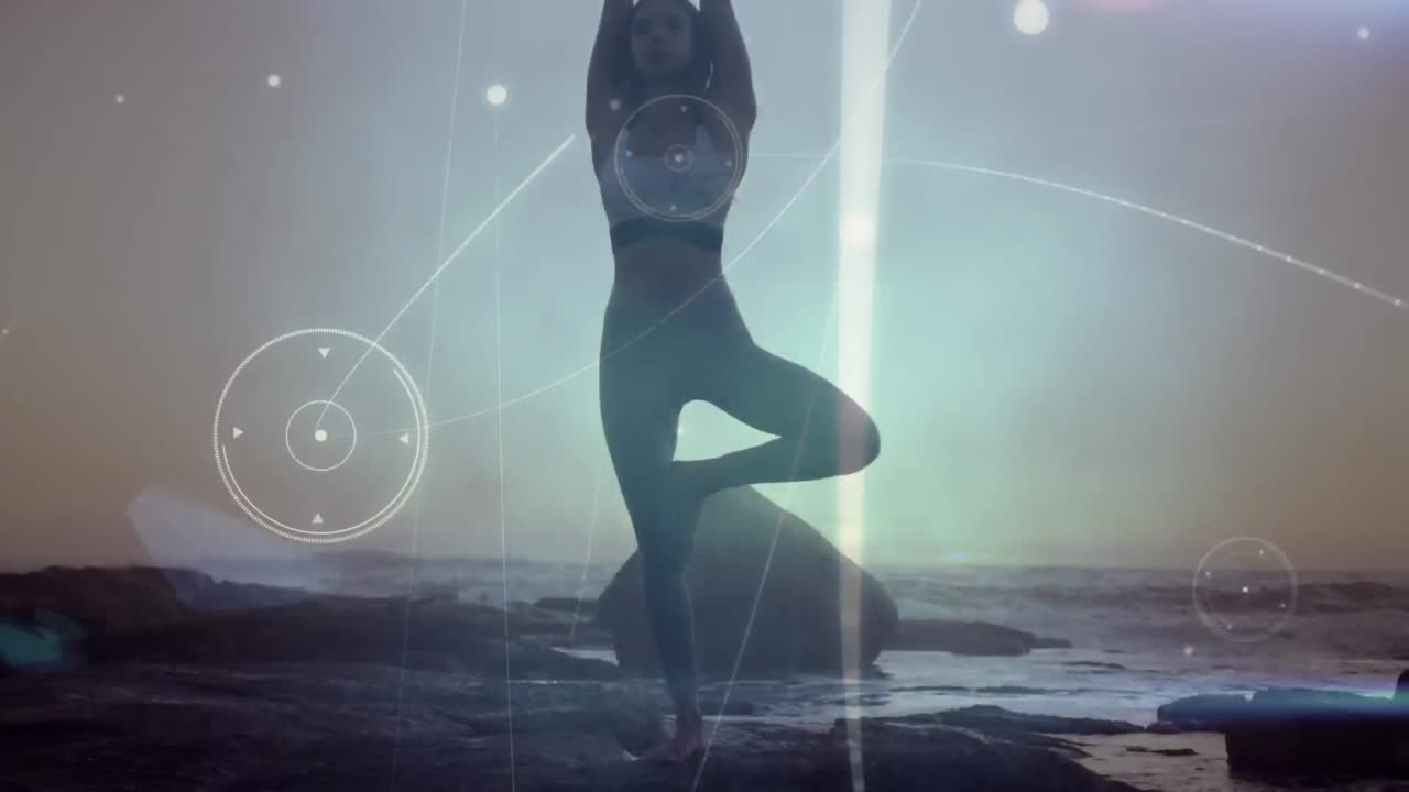 red de conexiones contra mujer caucásica preformando yoga de pie en una roca cerca del mar