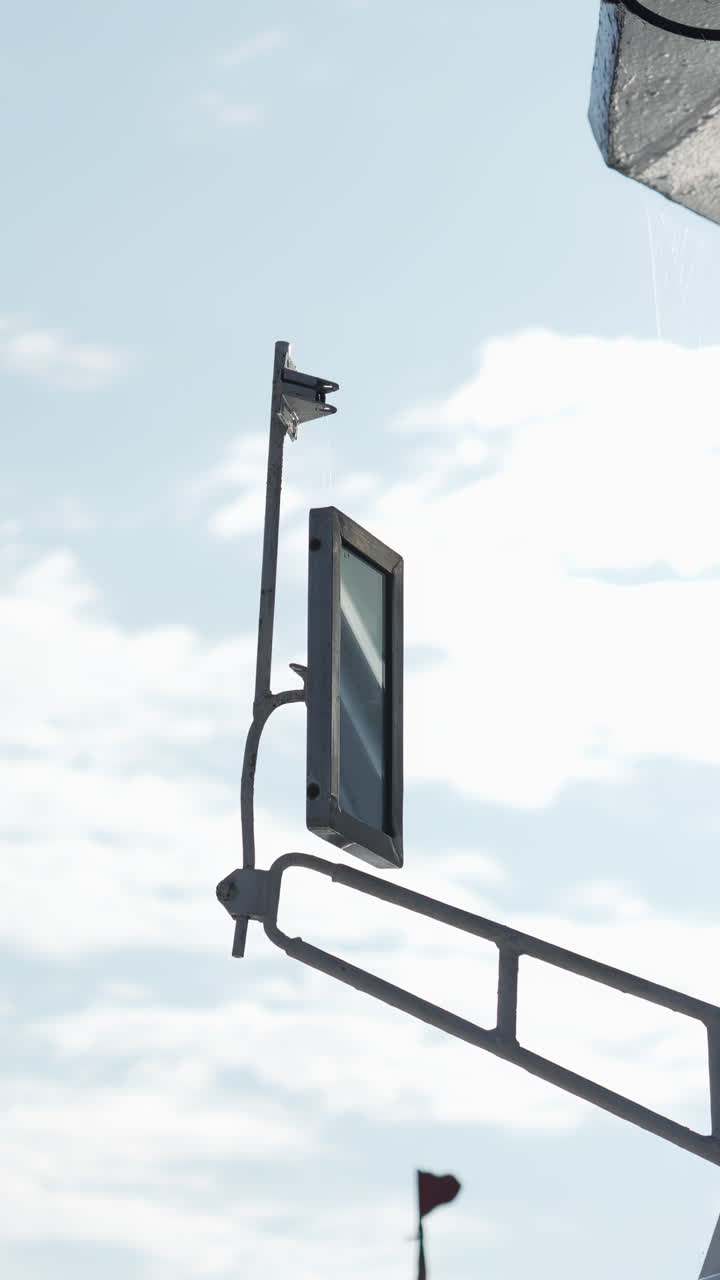 Mirror against a cloudy sky