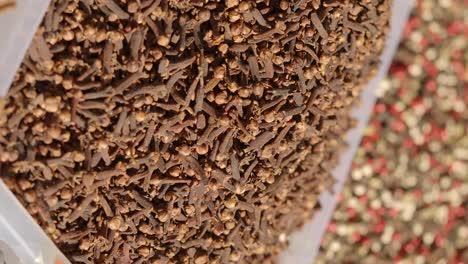 close up of cloves in container