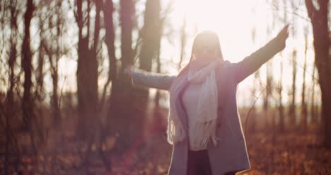 Smog-Concept-Young-Woman-Breathing-Fresh-Air-In-Forest