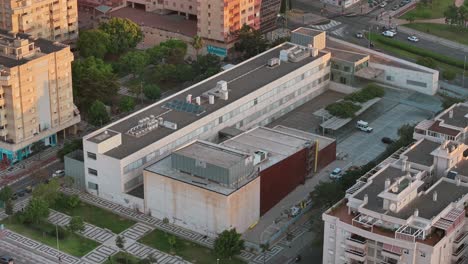 aerial view of urban building at sunset, showcasing city architecture