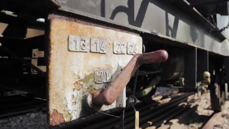 close-up of a rusty old train car coupling mechanism