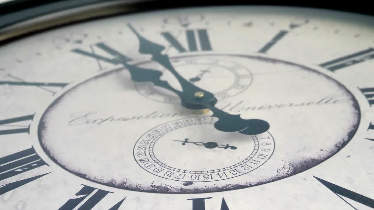 Closer look of the minute and second hand of the clock