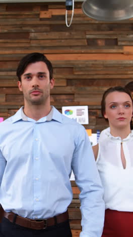 group of business executives walking in office