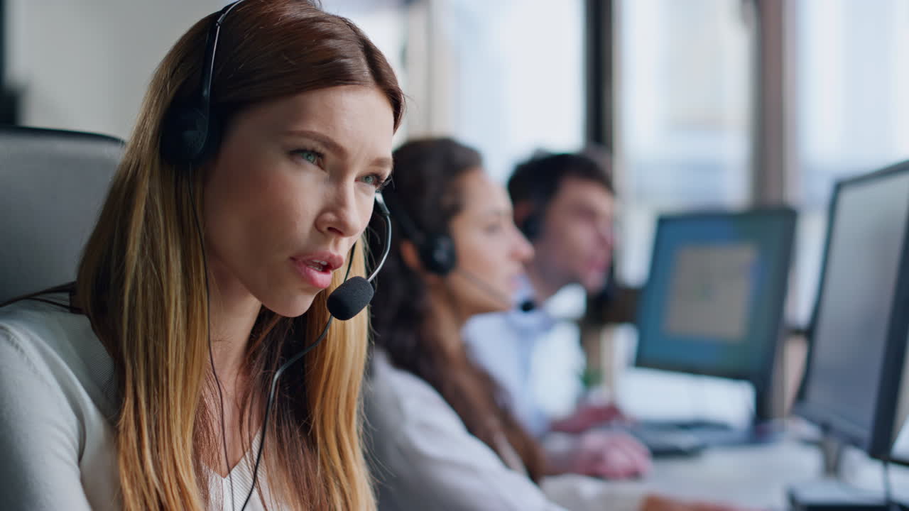 Tired operator talk headset in call center closeup. Service agent consult client