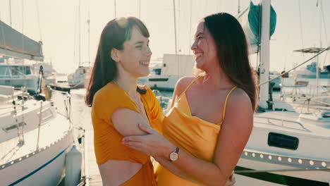 happy, vacation and women with a hug at the harbor