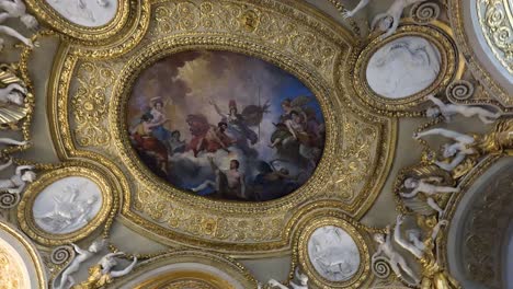 detailed view of the louvre's ceiling fresco