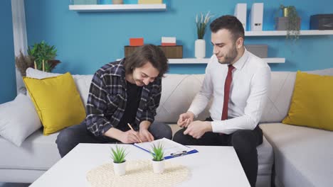 professional realtor negotiating new house purchase/lease with young man.