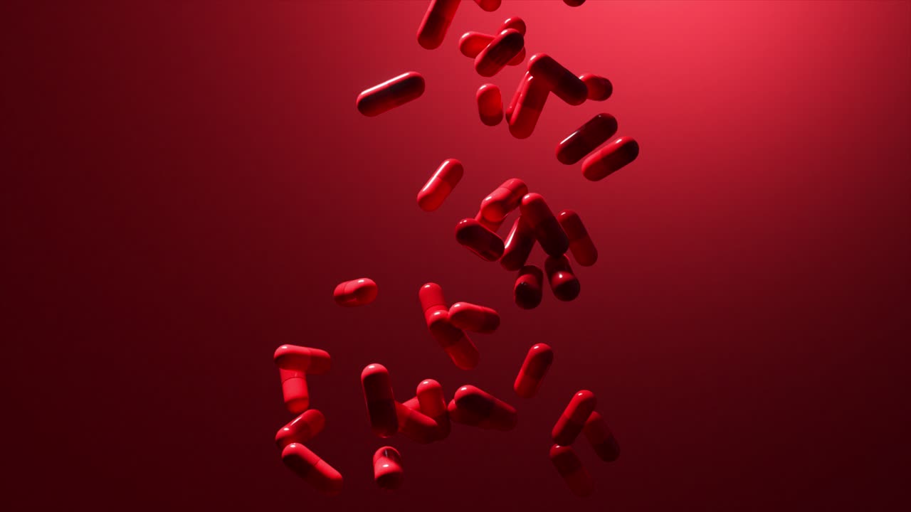 capsulas rojas que caen