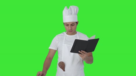 chef profesional indio haciendo comida pantalla verde