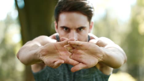 sport man stretching hands before fitness training outdoor. fitness man