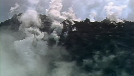 helicopter flying over the aftermath of mt st helens volcano eruption