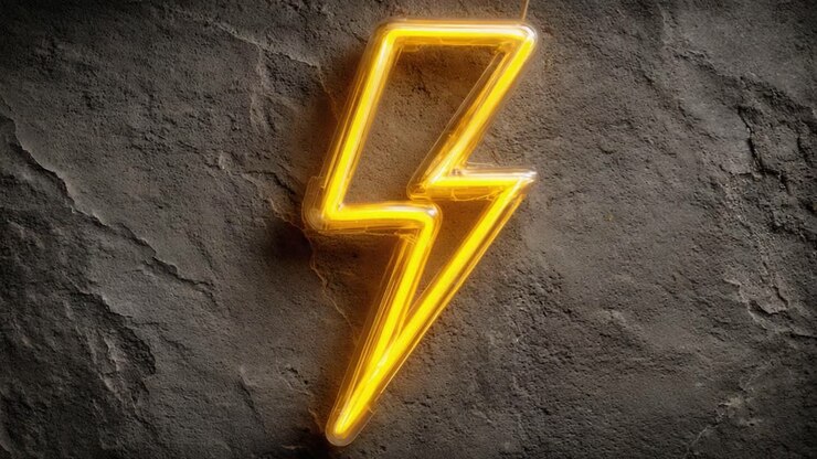 A striking neon lightning bolt illuminates a textured gray wall, creating an energetic and vibrant atmosphere perfect for evoking creativity and excitement
