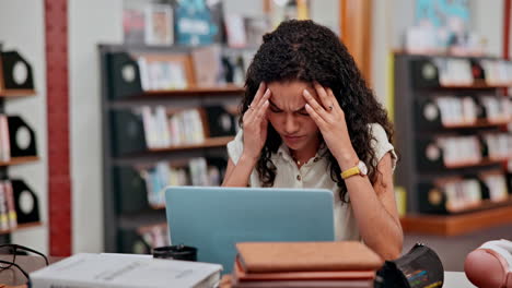 student working in a library