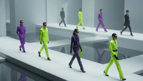 futuristic fashion showcase: striking models in vibrant neon outfits walk along a minimalistic runway, set against a sleek, monochromatic background highlighting bold styles