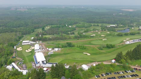 tpc toronto at osprey valley golf course in daytime in alton, caledon, ontario. - aerial pullback shot