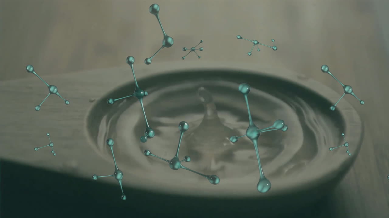 Animating molecular structure over water ripples in wooden spoon