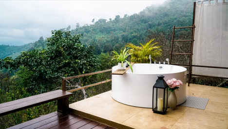 timelapse-outdoor-bath-tub-with-beautiful-mountain-hill-and-foggy-view-background