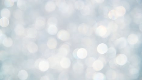 fondo abstracto de hilado de bokeh plateado