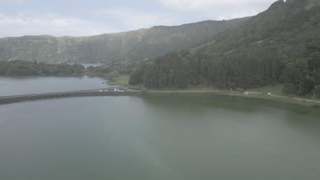 Sete-cidades-in-portugal-showcasing-serene-lakes-and-lush-green-mountains,-aerial-view