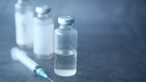 vaccines, syringe and vials