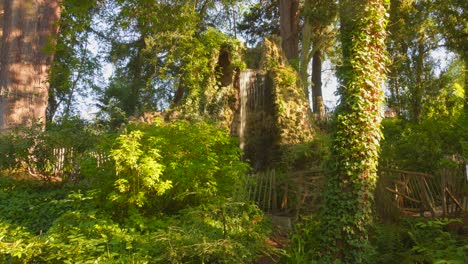 discover the enchanting waterfall nestled within the lush greenery of the toulouse botanical garden in france