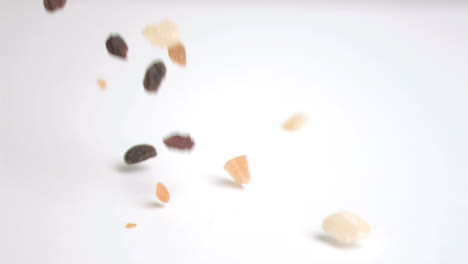 dried fruit falling in super slow motion