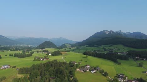 austrian alpine valley with summer pastures. aerial view