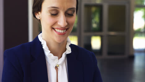 businesswoman working on laptop at desk 4k