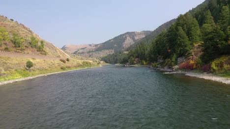 low fly over hot spring river in jackson, wyoming