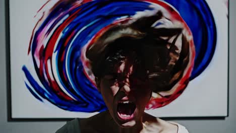 woman screaming in front of abstract art