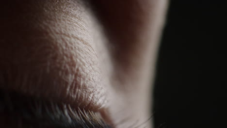 close-up-macro-human-eye-opening-blinking-light-revealing-beautiful-iris