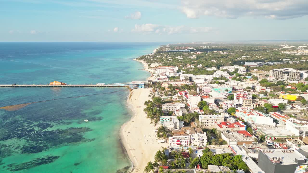 Sunny aerial view of Playa del Carmen beach and town on Mexico’s Caribbean coast