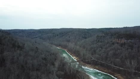 Winter-Mountains,-Bridge,-and-Cliff-Landscape