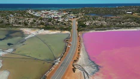 Toma-De-Drones-Del-Paisaje-Del-Lago-Rosado-De-La-Laguna-Hutt,-Lago-Salado-Marino-De-La-Laguna-Hutt-En-La-Costa-De-Coral-Cerca-De-Port-Gregory,-Viajes-Panorámicos-Y-Destino-Turístico,-Australia