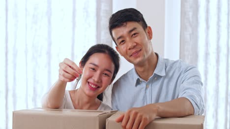happy couple moving in
