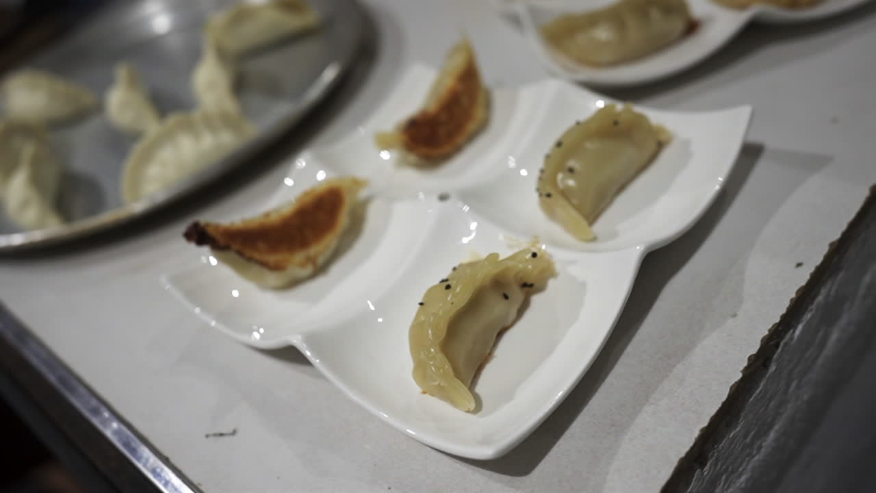 Meat empanadas on elegant white plate ready to be served. Traditional Argentine food, close up